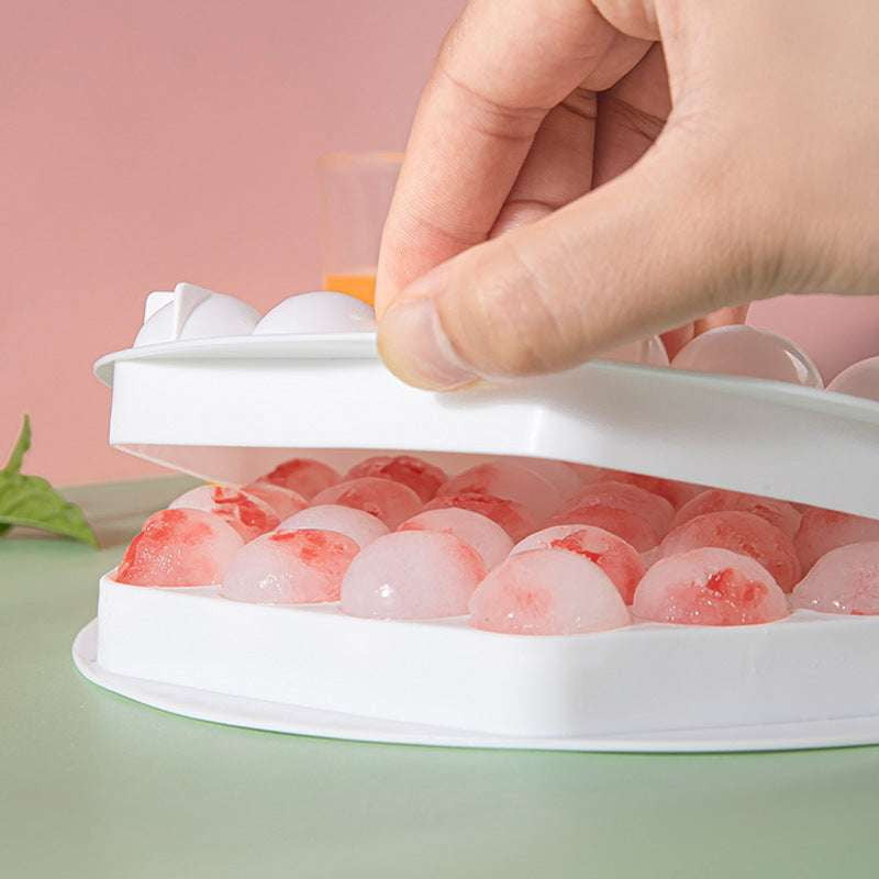 durable ice tray, freezer tray lid, rounded ice molds - available at Sparq Mart