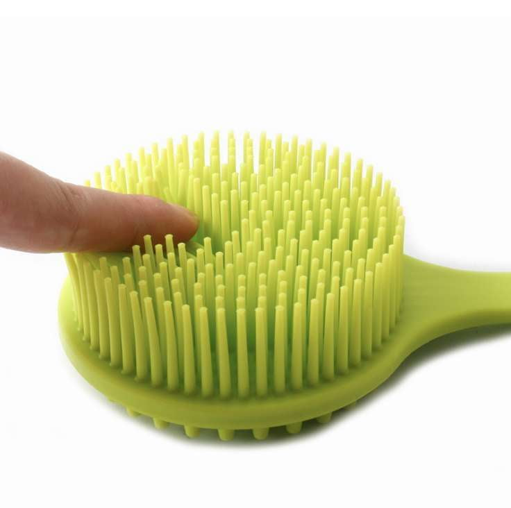 exfoliating back scrubber, flexible bath tool, silicone scrubber stick - available at Sparq Mart