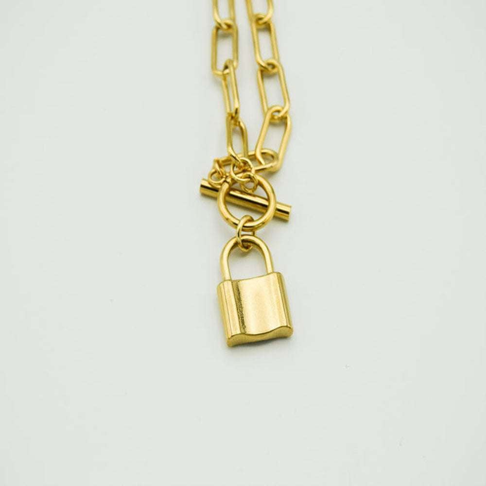 gold pendant necklace, silver chain necklace, vintage lock pendant - available at Sparq Mart